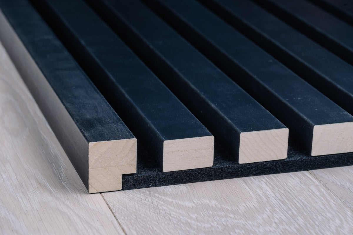 Anthracite aspen slat edge on black felt, side view