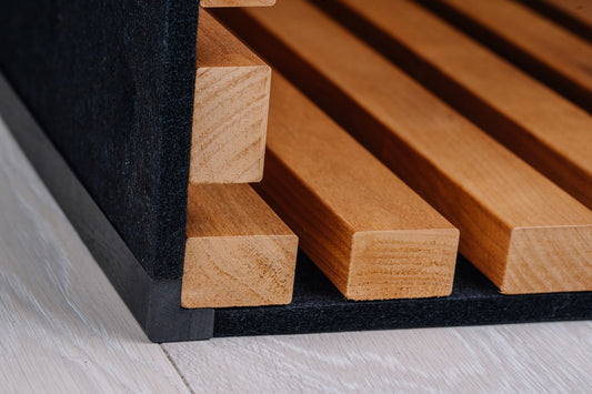 Thermo aspen slat panel at a wall corner with a black corner profile