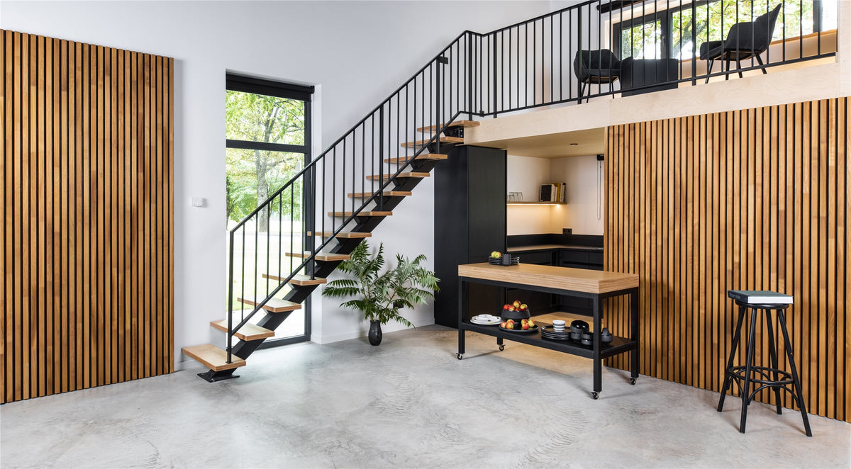 Industrial style loft with thermo aspen slat walls and a concrete floor